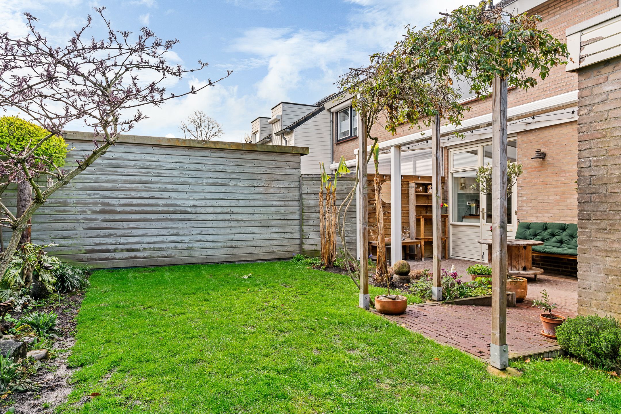 Modernized Semi-Detached Home with Veranda, Carport and Private Driveway in Quiet Location — 26