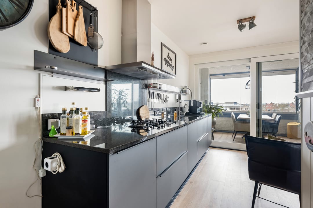 Modern Corner Apartment with Panoramic Views and Year-Round Loggia — 22