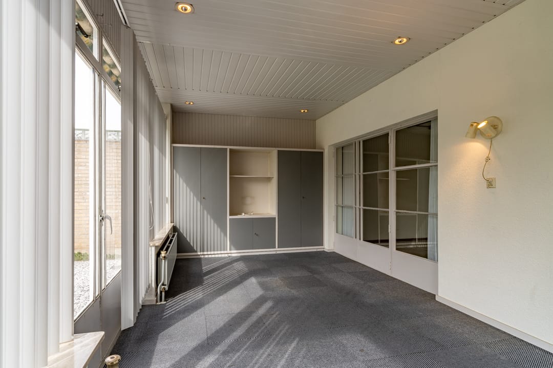 Spacious semi-detached home with garden room and garage in popular Beek neighborhood — 13