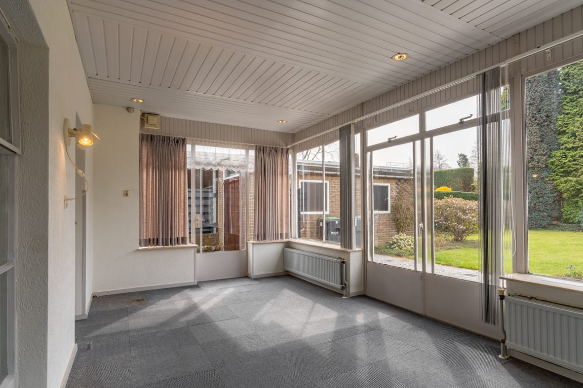 Spacious semi-detached home with garden room and garage in popular Beek neighborhood — 14