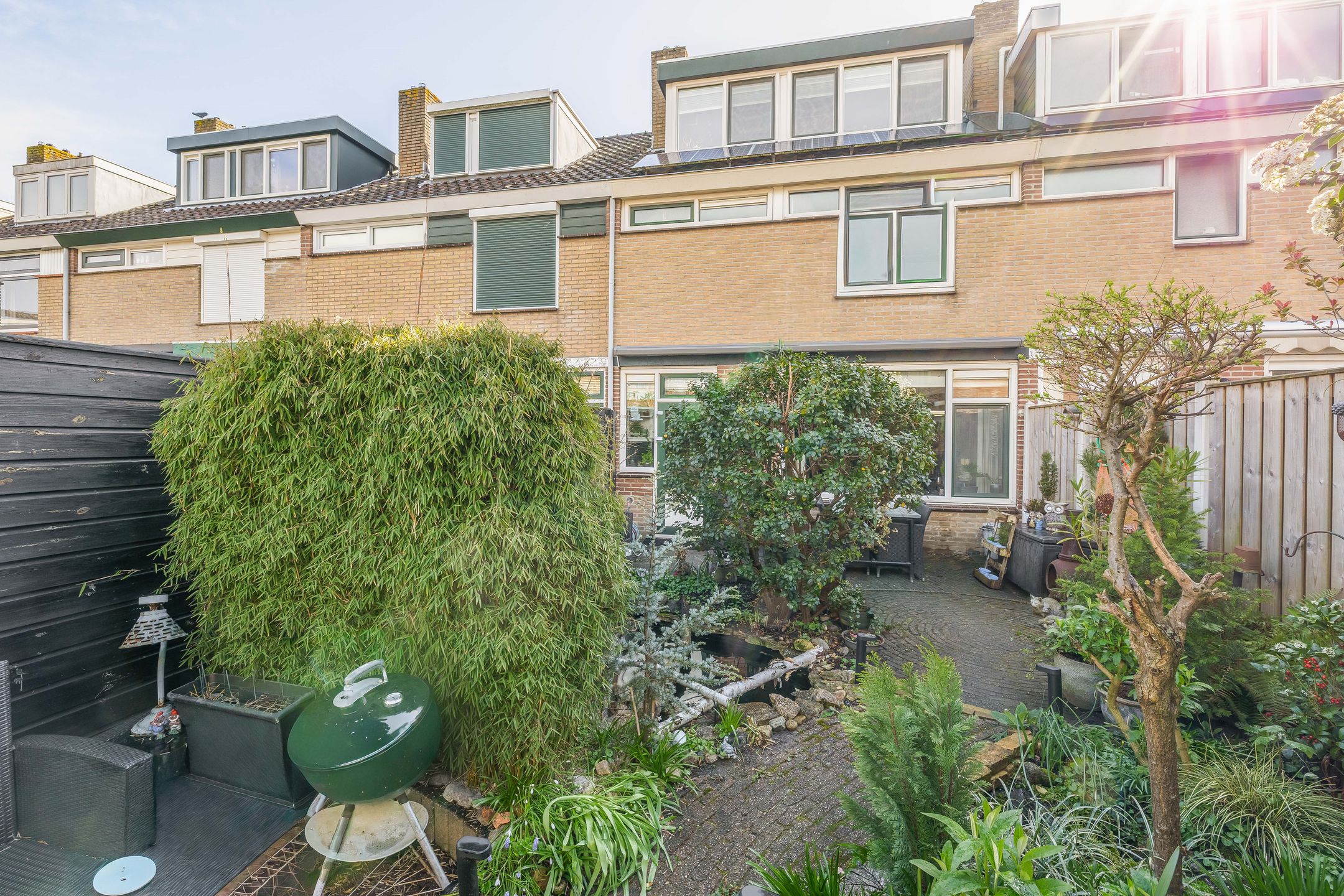 Well-maintained terraced house with 3 bedrooms and garden in child-friendly Rozenburg — 24