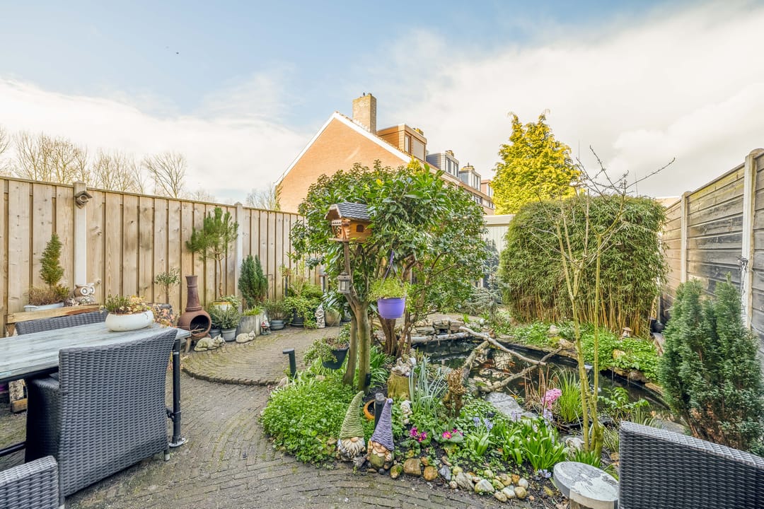 Well-maintained terraced house with 3 bedrooms and garden in child-friendly Rozenburg — 26