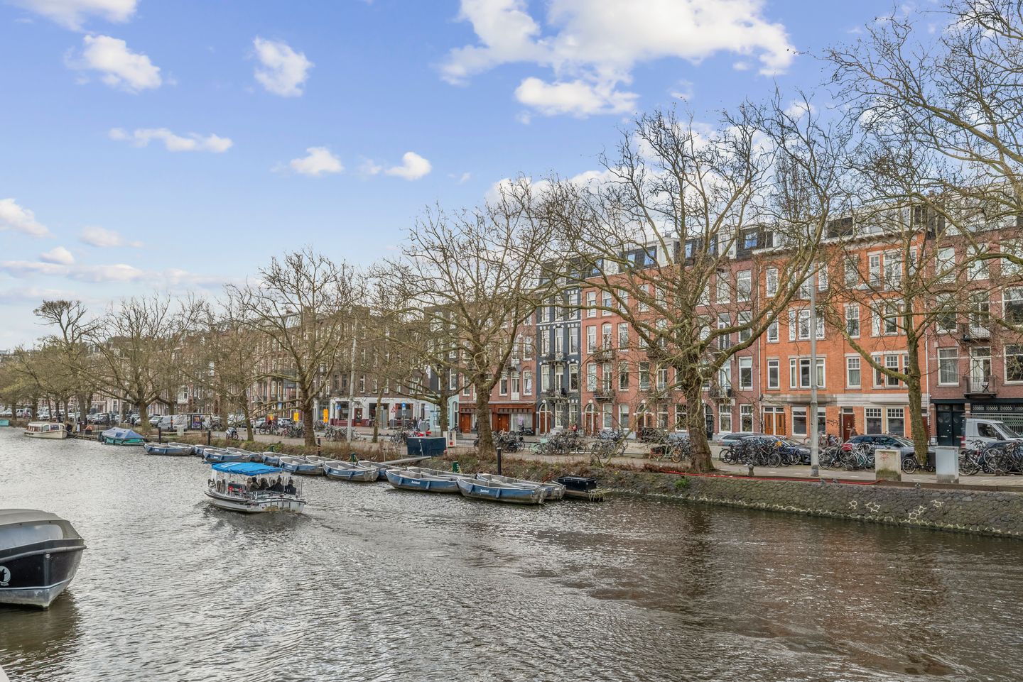 Charming top-floor apartment with canal views on vibrant Nassaukade in Amsterdam — 20