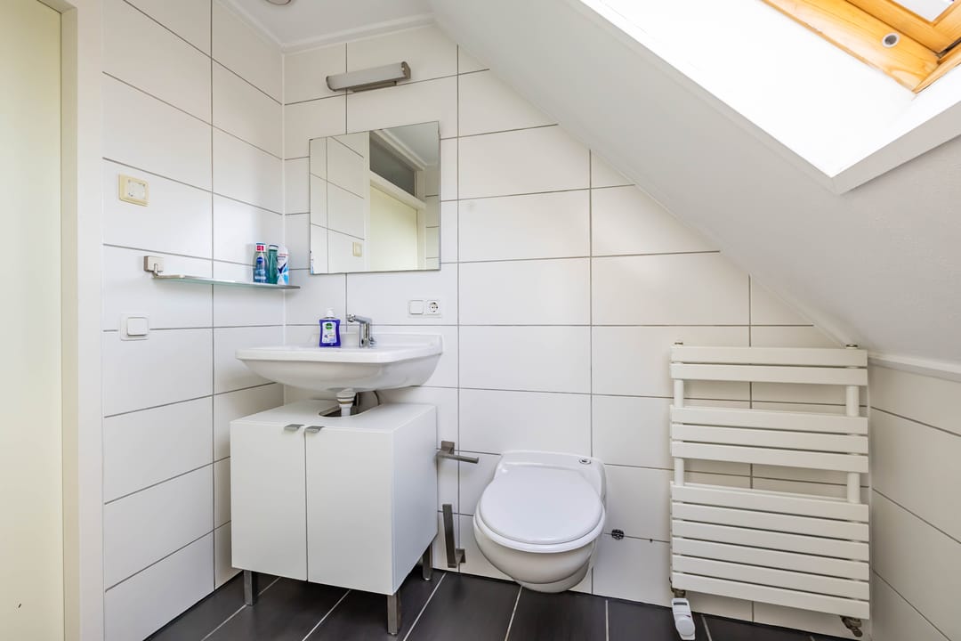 Extended semi-detached house with new kitchen in child-friendly Zuidlaren — 32