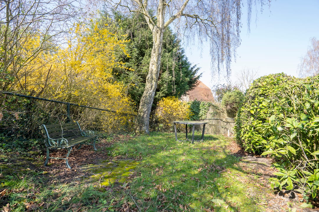 Characteristic semi-detached home with spacious garden and open dike views — 26