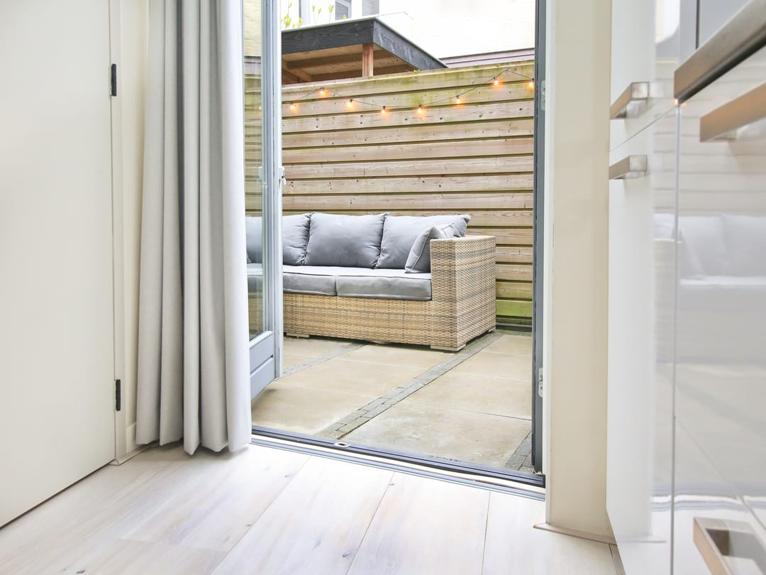 Move-in ready ground floor apartment with garden and church view in Haarlem center — 17