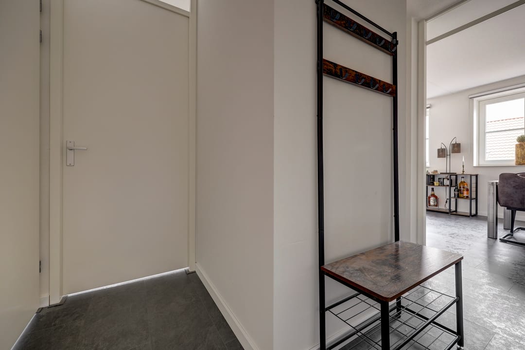 Modern Sustainable Apartment in Characteristic Farmhouse Complex — 16