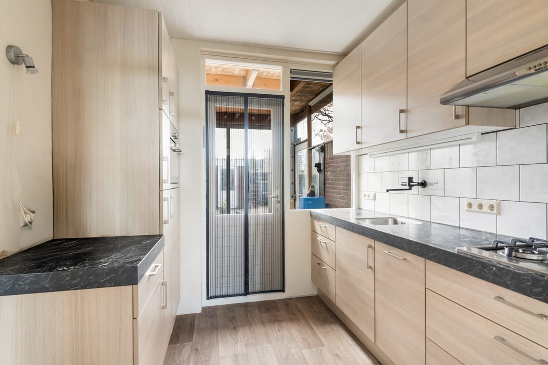Spacious corner house with dijk view, garden and two parking spaces — 23