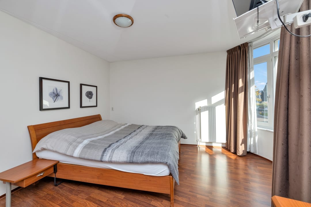 Spacious double upper apartment with three terraces and private parking in Helmond center — 31