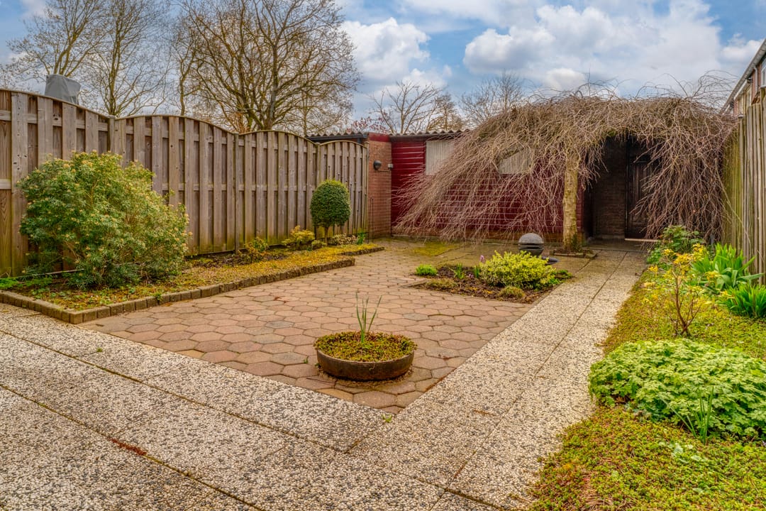 Attractive mid-terraced home with deep private garden in family-friendly Westervoort location — 28