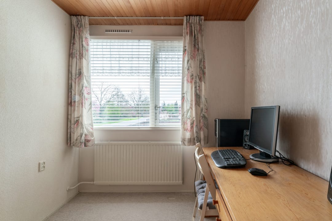 Attractive mid-terraced home with deep private garden in family-friendly Westervoort location — 43