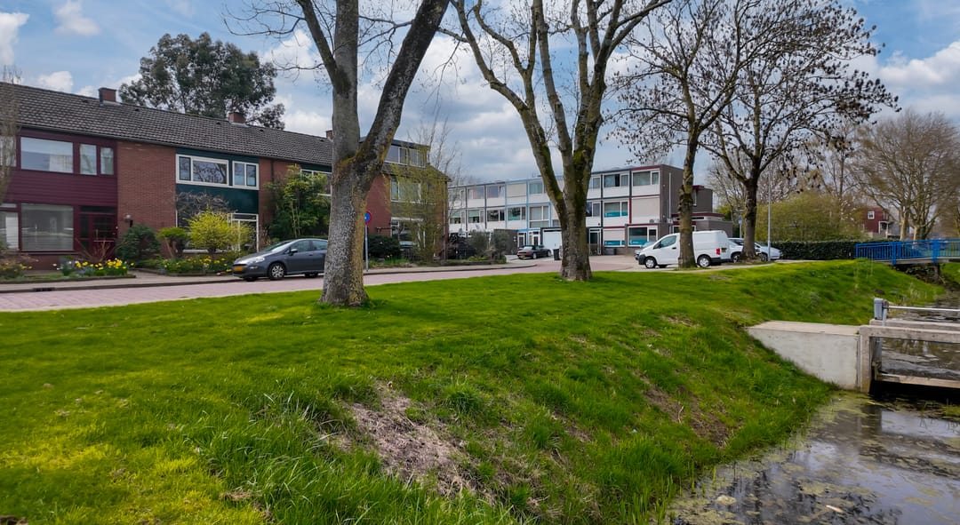 Attractive mid-terraced home with deep private garden in family-friendly Westervoort location — 53