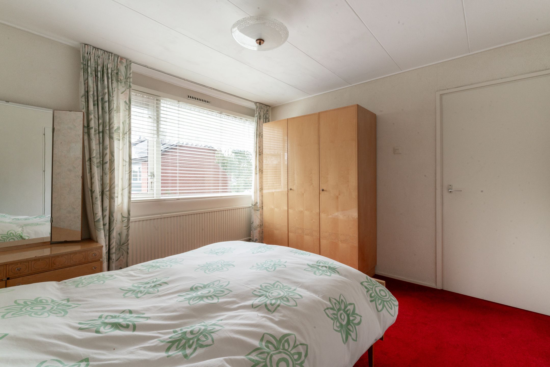 Attractive mid-terraced home with deep private garden in family-friendly Westervoort location — 39