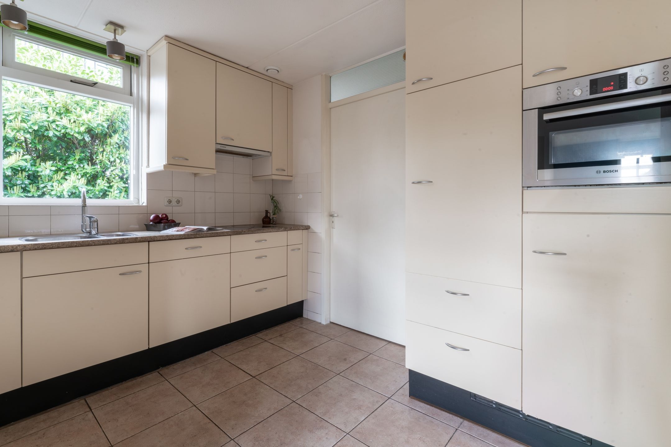 Foto 24 van Reuweg 1-A