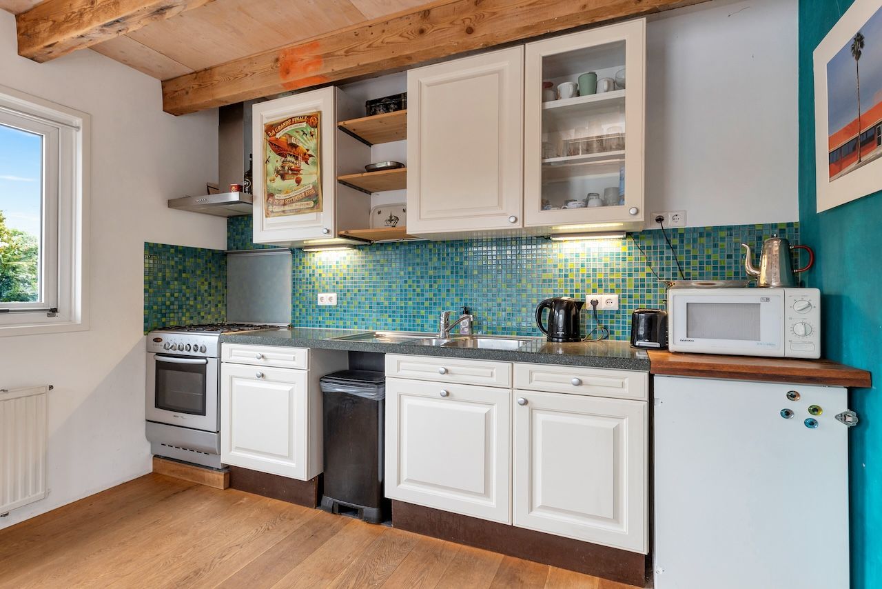 Foto 27 van Grasweg 21-A