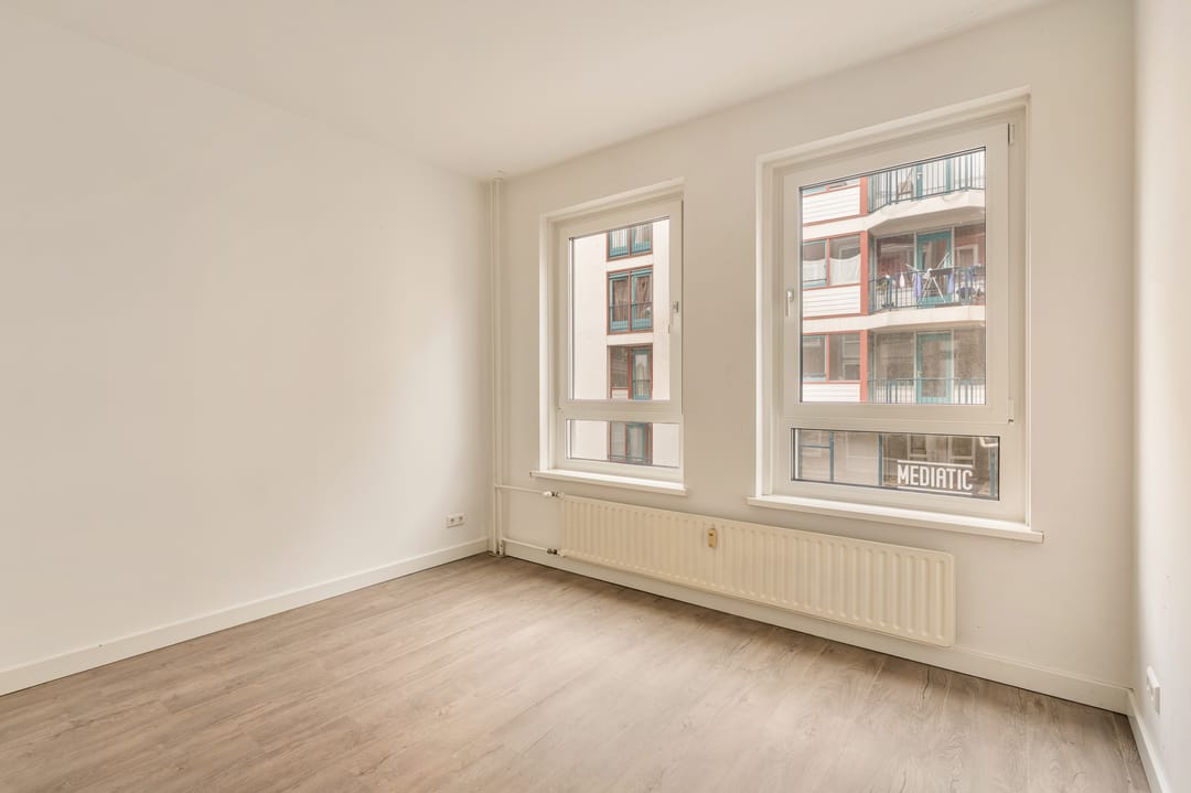 Foto 11 van Jodenbreestraat 116