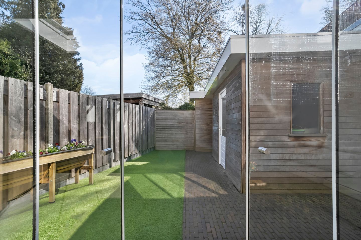 Foto 40 van Brederostraat 4