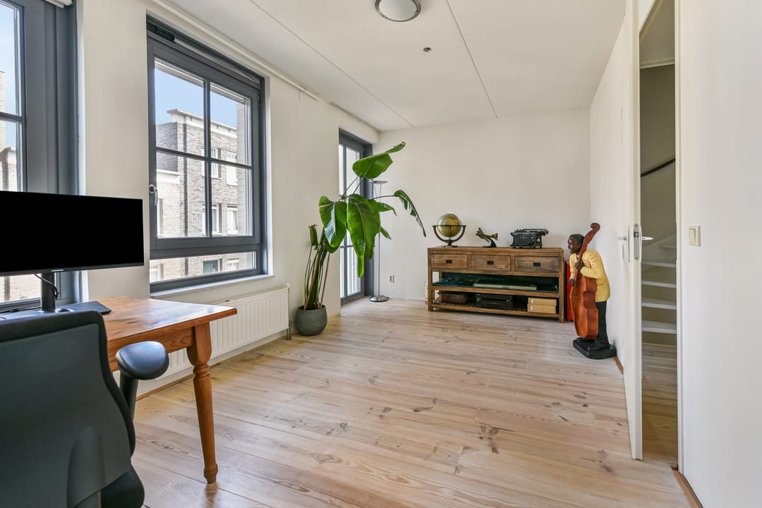 Foto 22 van Scharwoudestraat 21