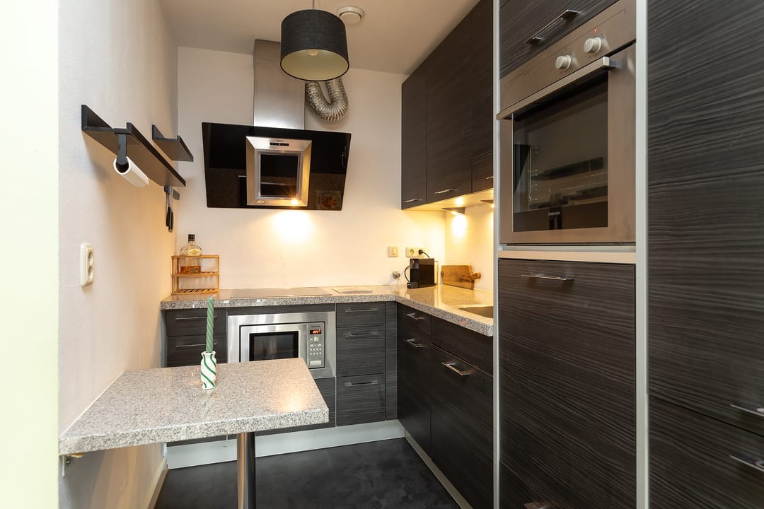 Foto 17 van Langestraat 63-J