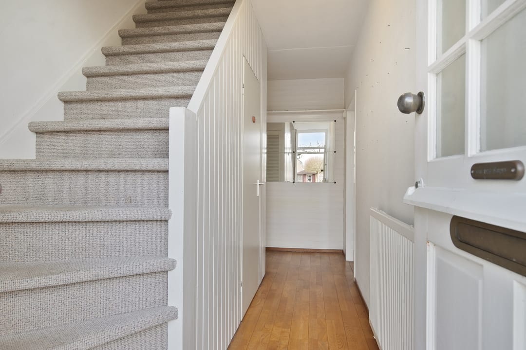 Charming 1970s Starter Home with Playful Z-Shaped Living Room — 7
