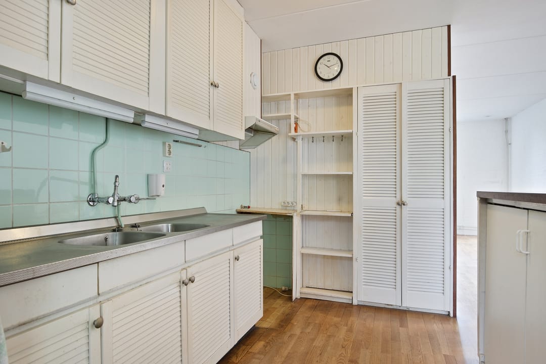 Charming 1970s Starter Home with Playful Z-Shaped Living Room — 17