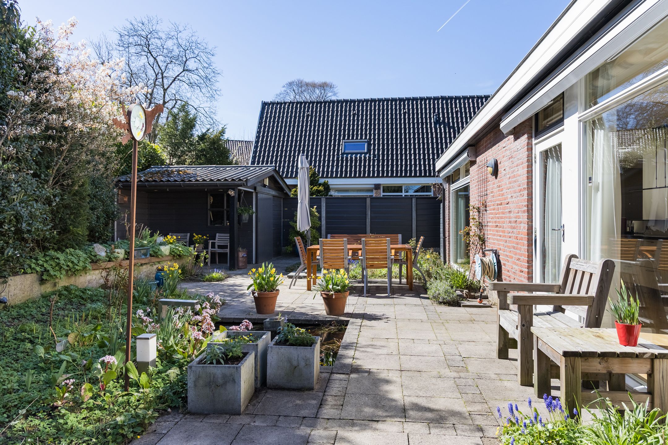 Extended semi-bungalow with garage and landscaped garden near Lochemse Berg — 45