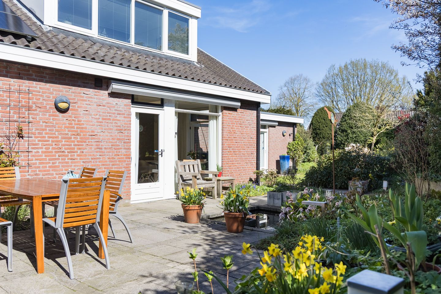 Extended semi-bungalow with garage and landscaped garden near Lochemse Berg — 44