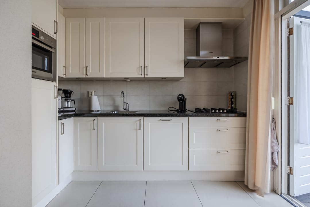 Well-maintained terraced house with two gardens and carport in Donkenbuurt — 13