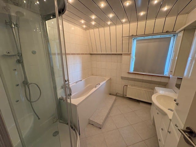 Tussenwoning te koop: Oldenzaalsestraat 99, Enschede