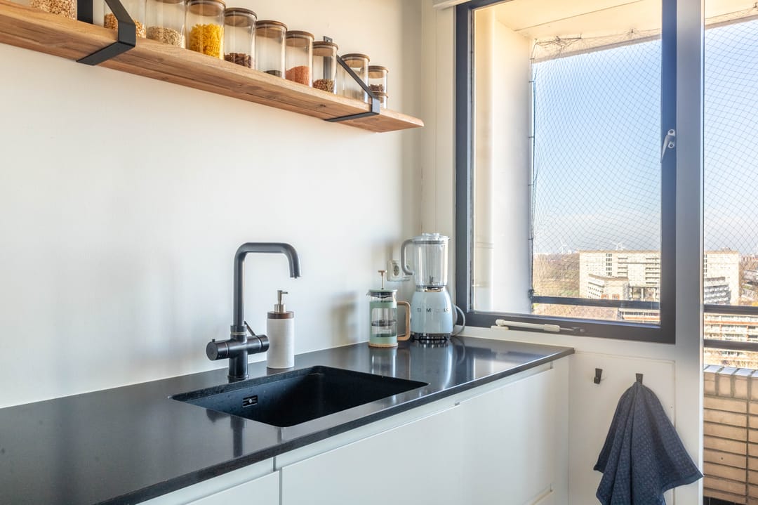 Renovated Corner Apartment with Panoramic Sloterplas Views on Top Floor — 13