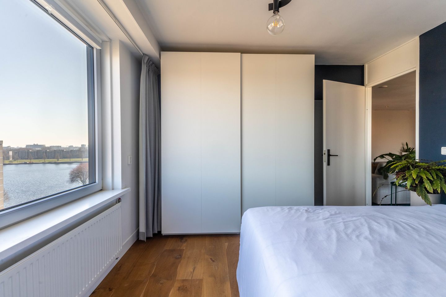 Renovated Corner Apartment with Panoramic Sloterplas Views on Top Floor — 19