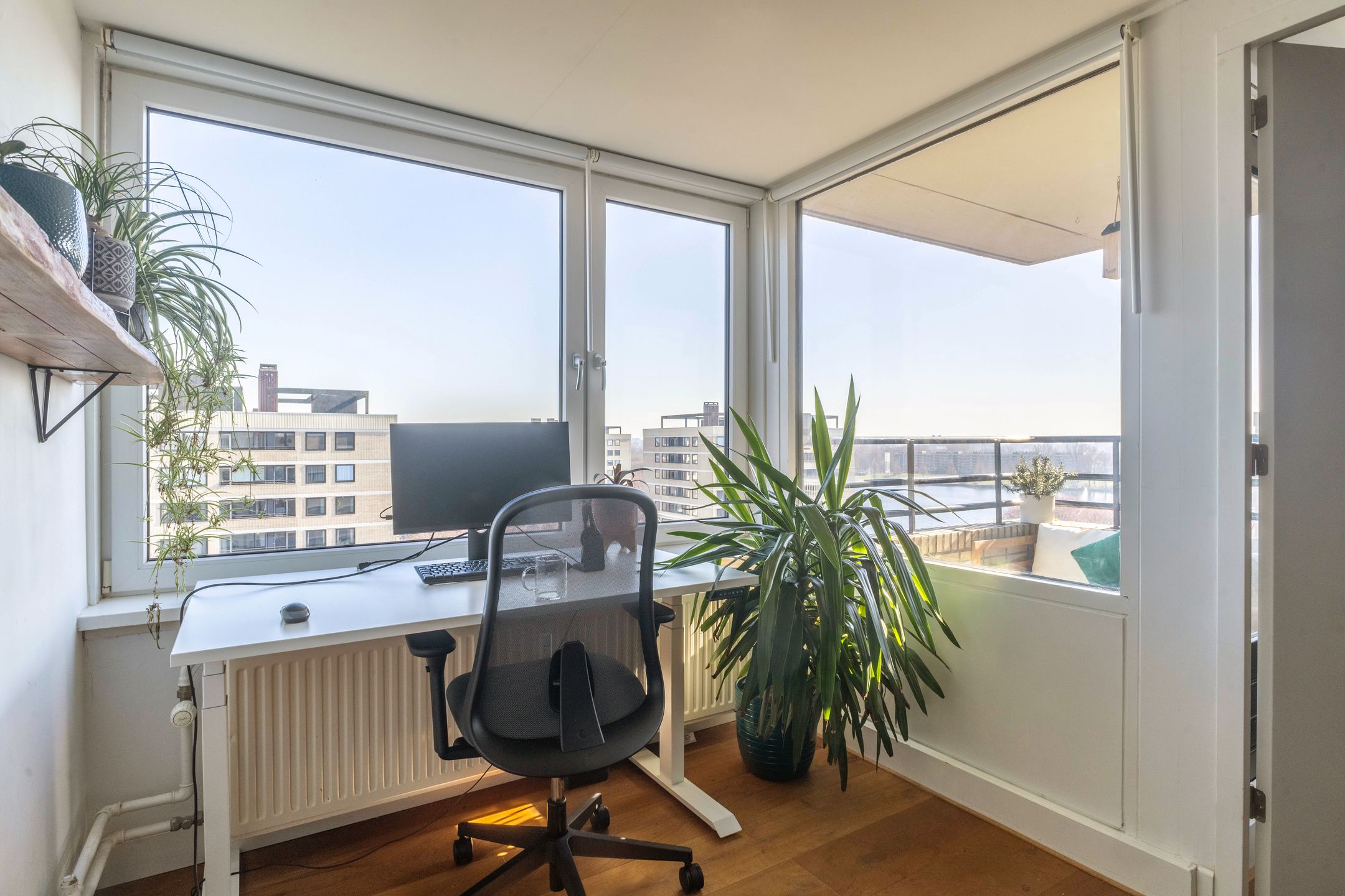 Renovated Corner Apartment with Panoramic Sloterplas Views on Top Floor — 21