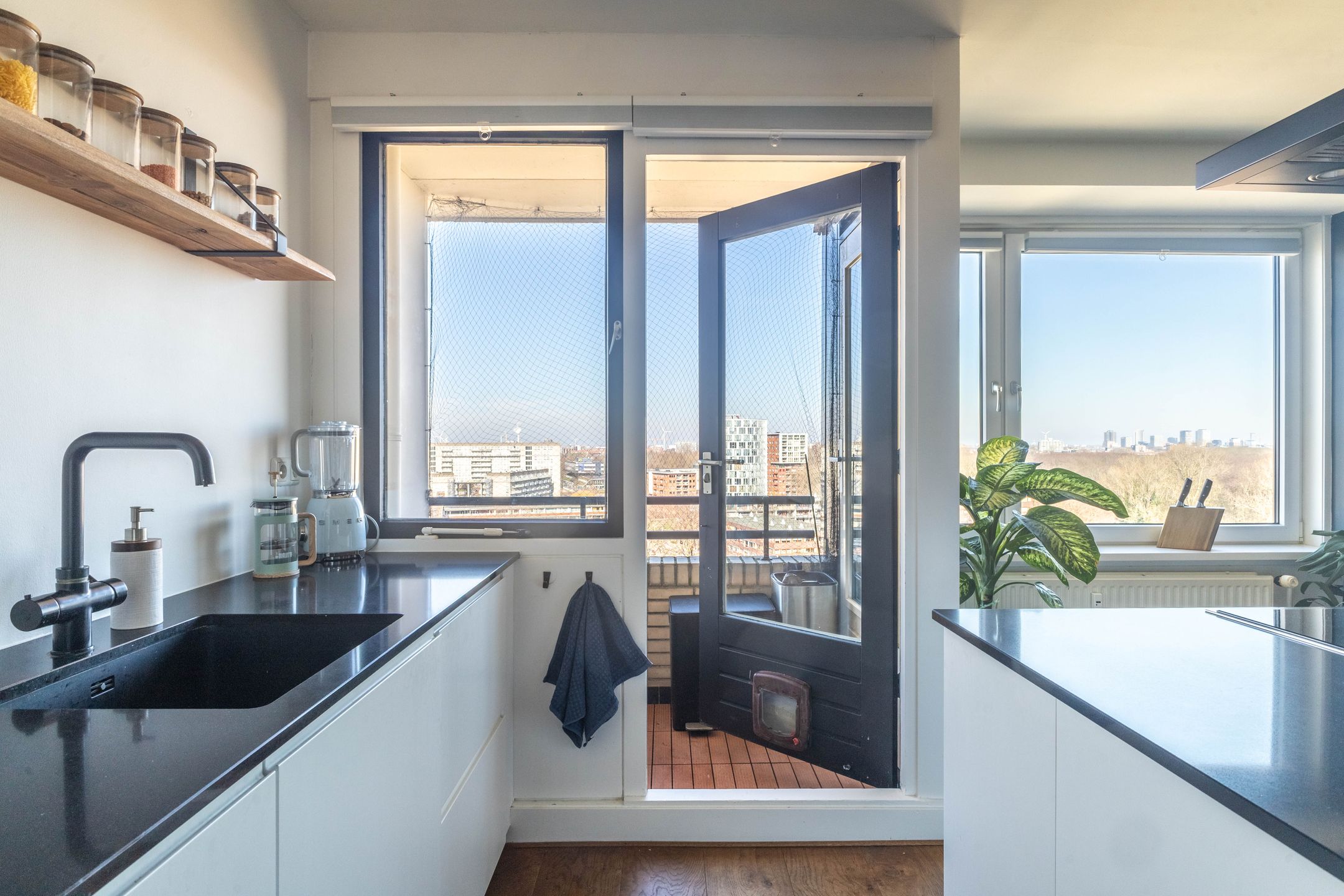 Renovated Corner Apartment with Panoramic Sloterplas Views on Top Floor — 12