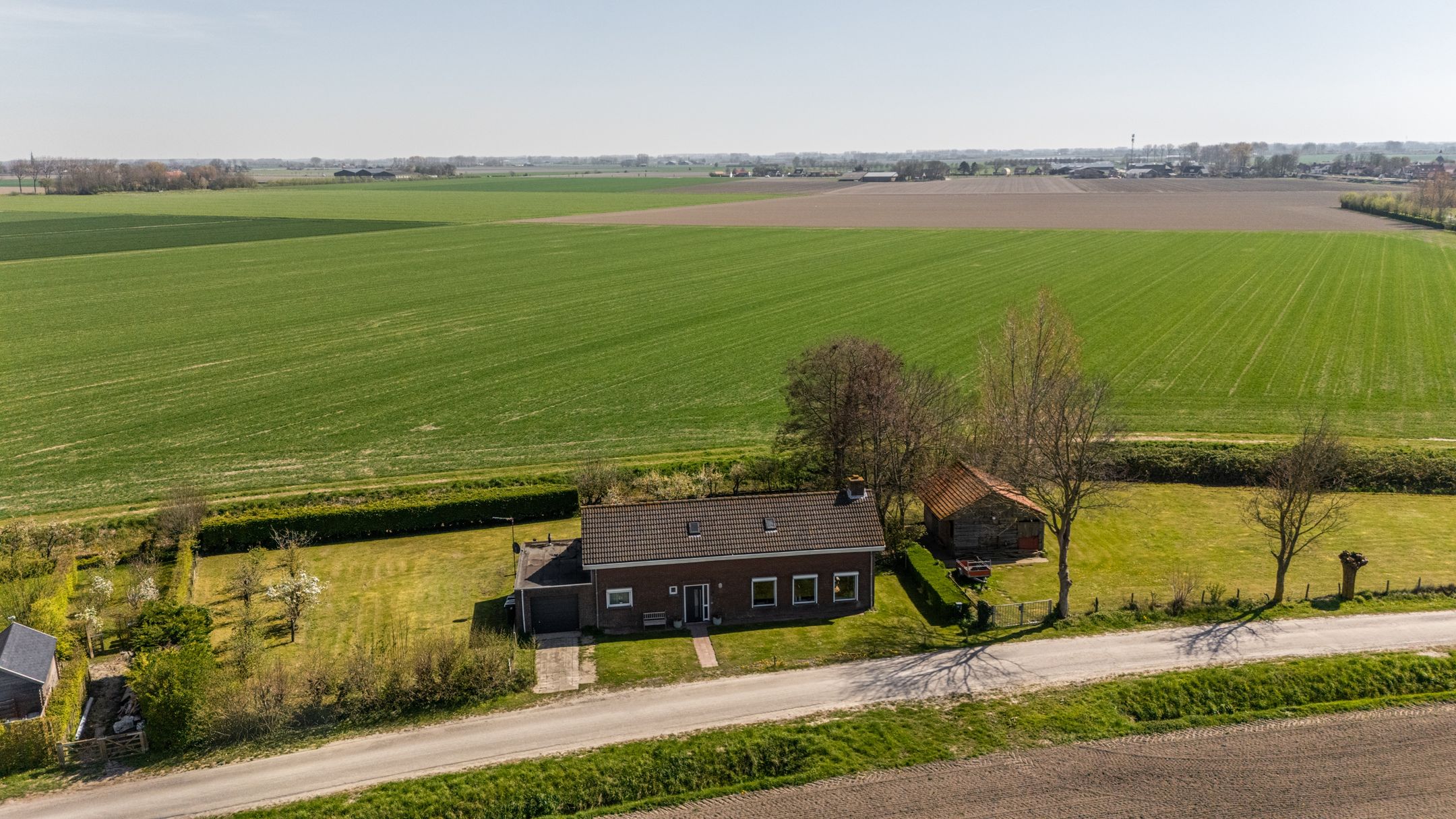 Detached Dike House with Expansive Polder Views and Large Plot Near the Beach — 48