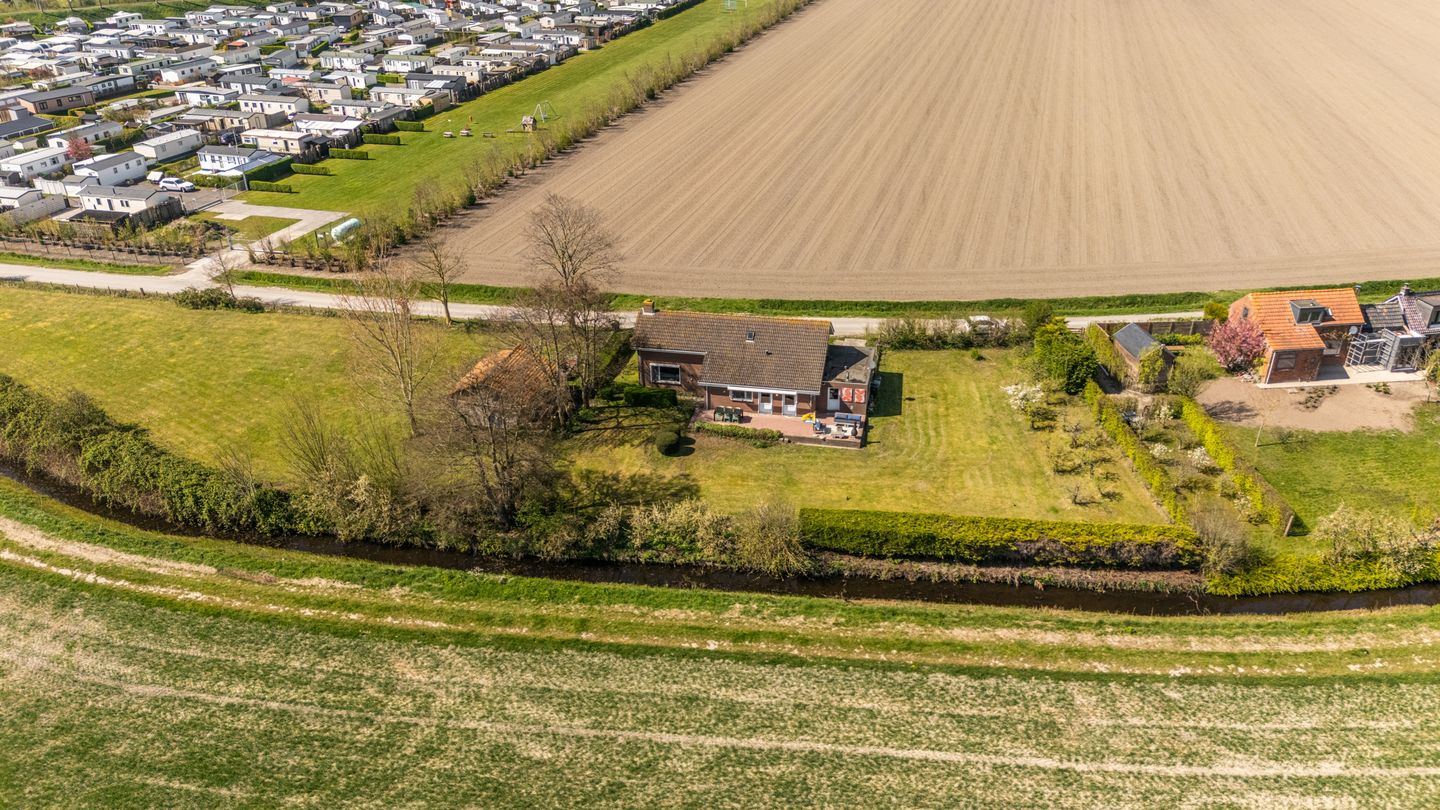 Detached Dike House with Expansive Polder Views and Large Plot Near the Beach — 50