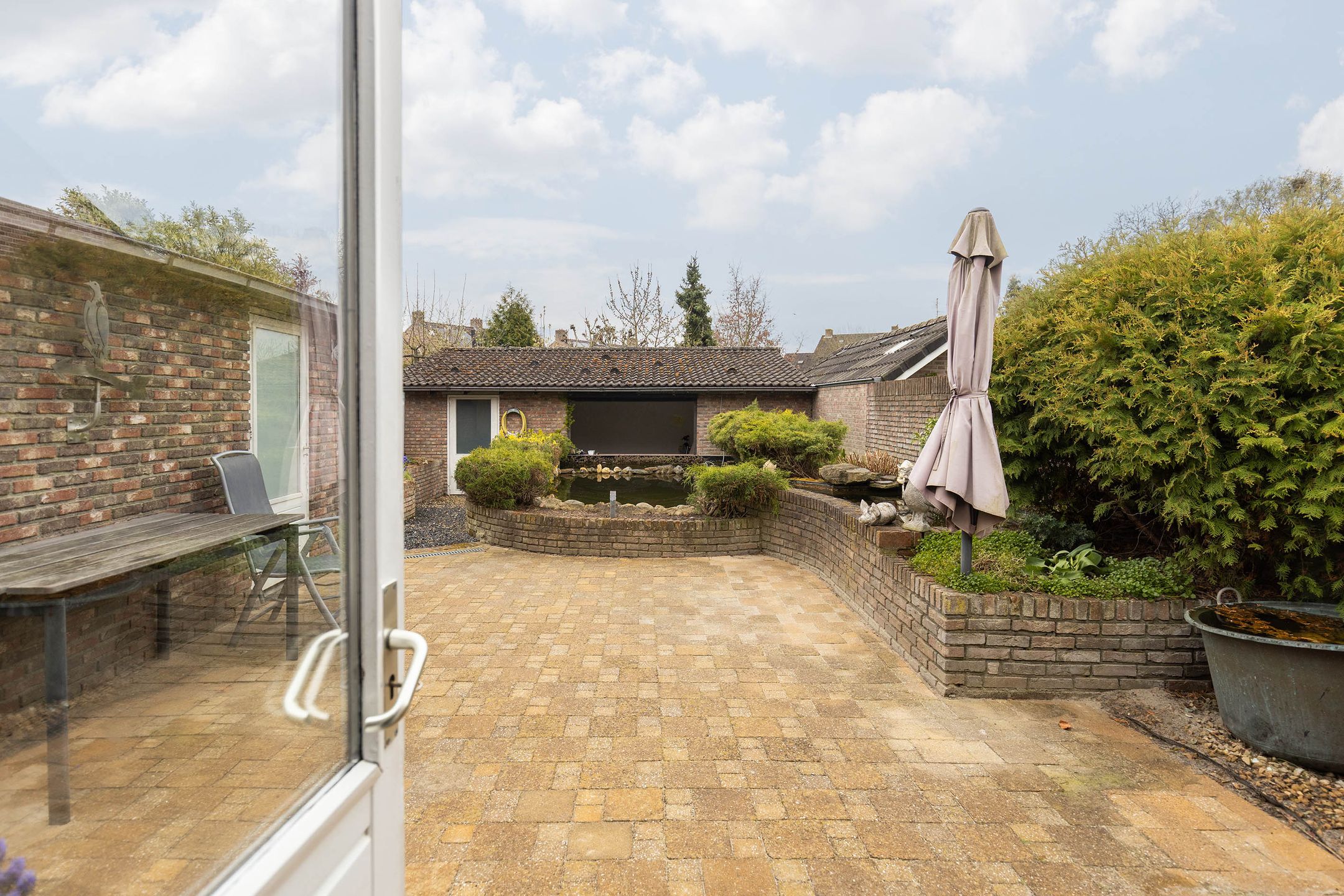 Foto 30 van Millenerstraat 34