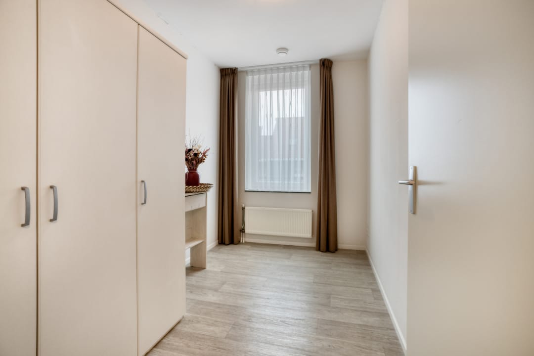 Spacious corner apartment with balcony and parking in Asten centre — 17