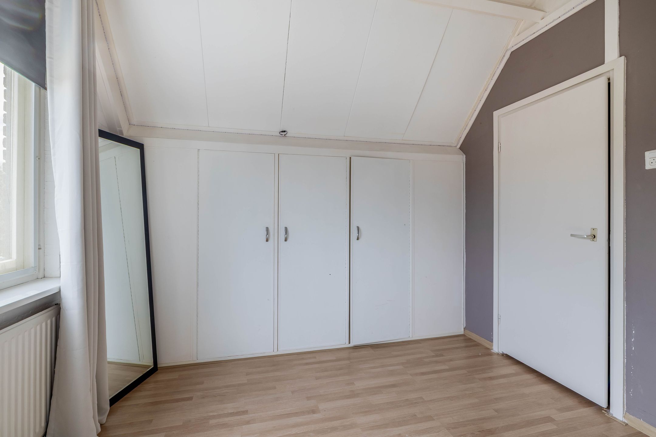 Instapklare maisonnette met drie slaapkamers en balkon in rustige Rotterdamse woonwijk — 24