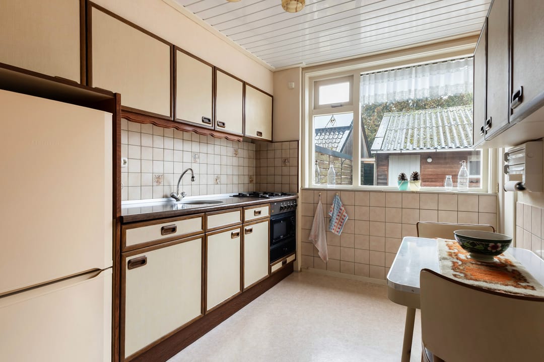 Characteristic semi-detached home with free view at the edge of Buitenpost — 16
