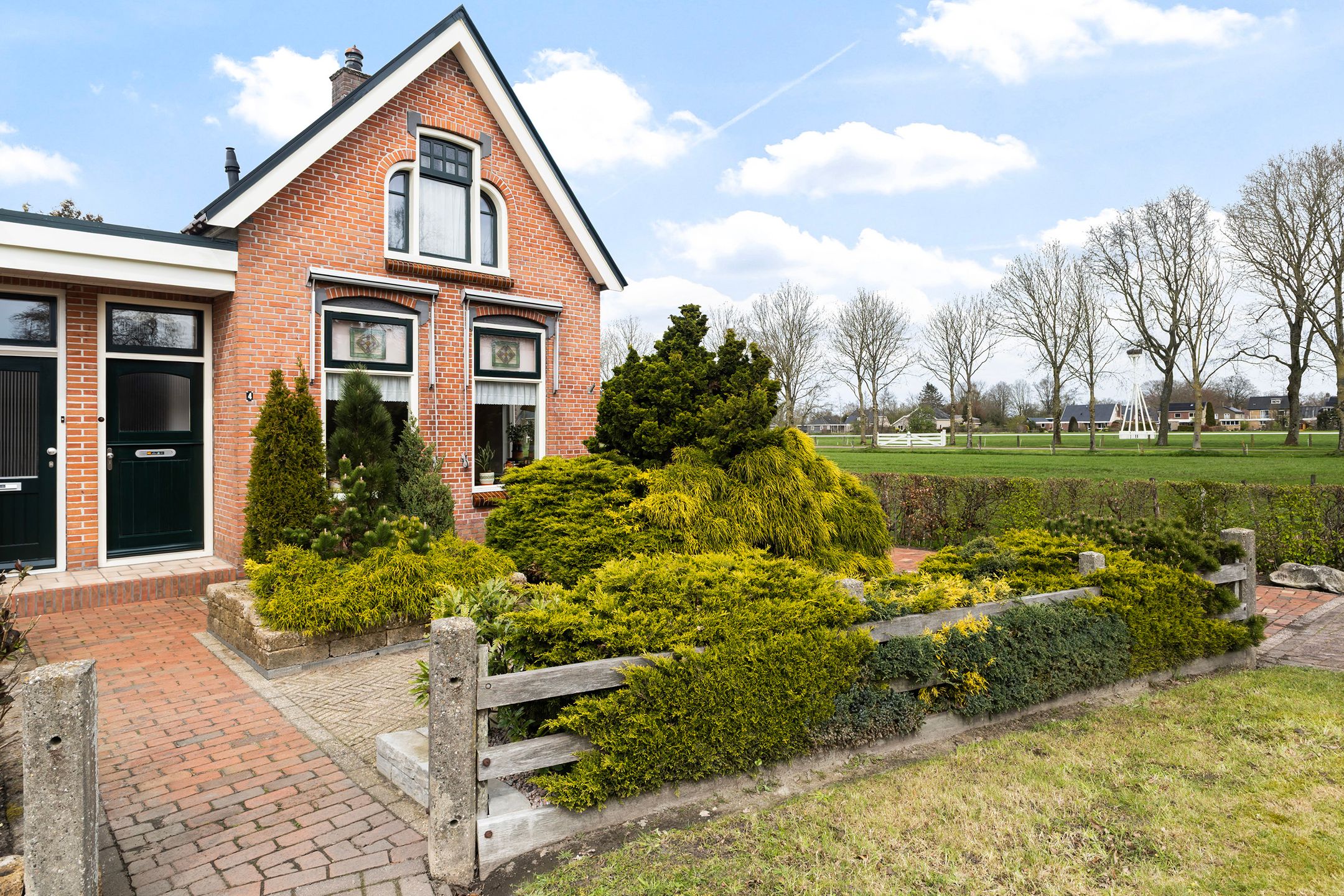 Characteristic semi-detached home with free view at the edge of Buitenpost — 39