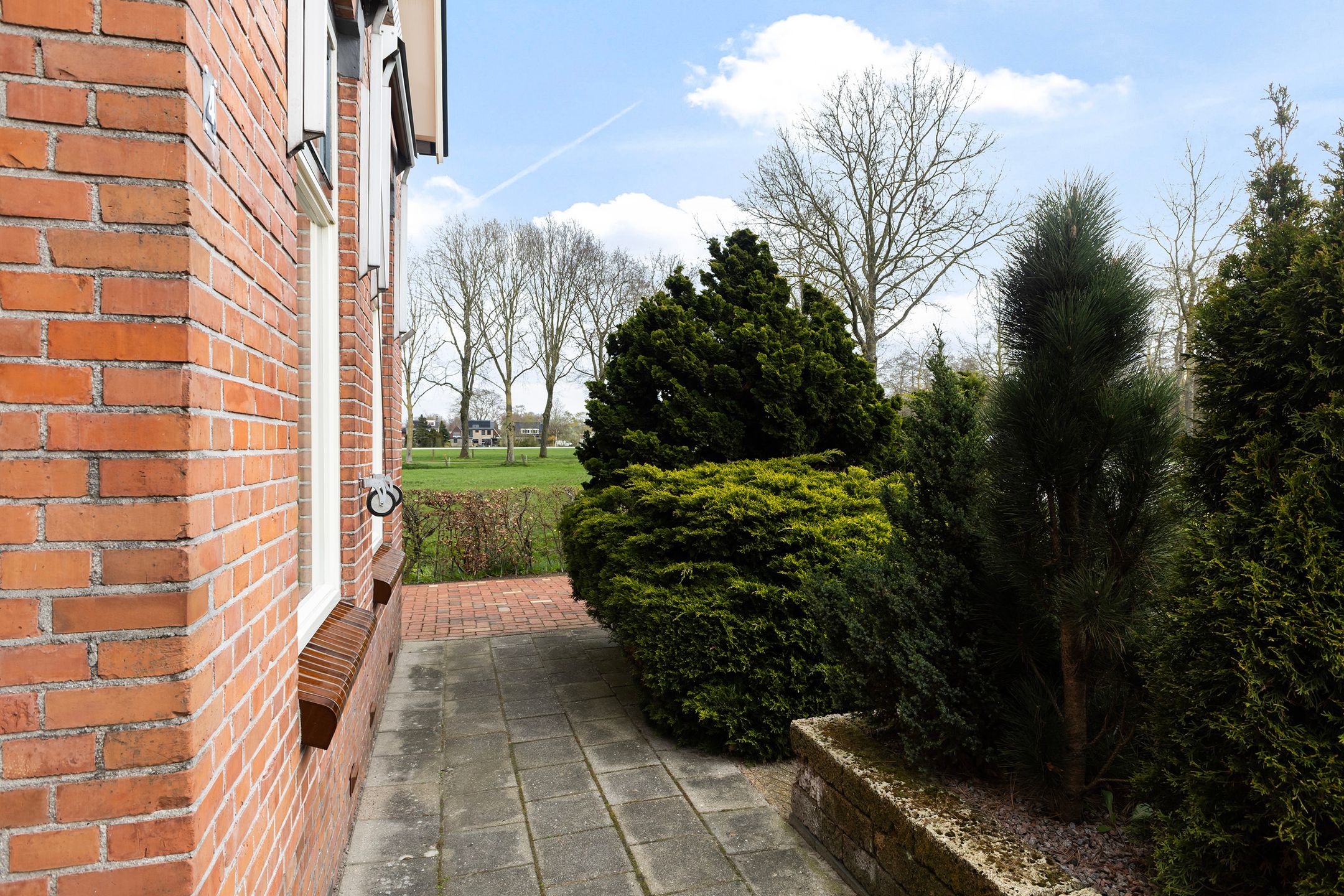 Characteristic semi-detached home with free view at the edge of Buitenpost — 42