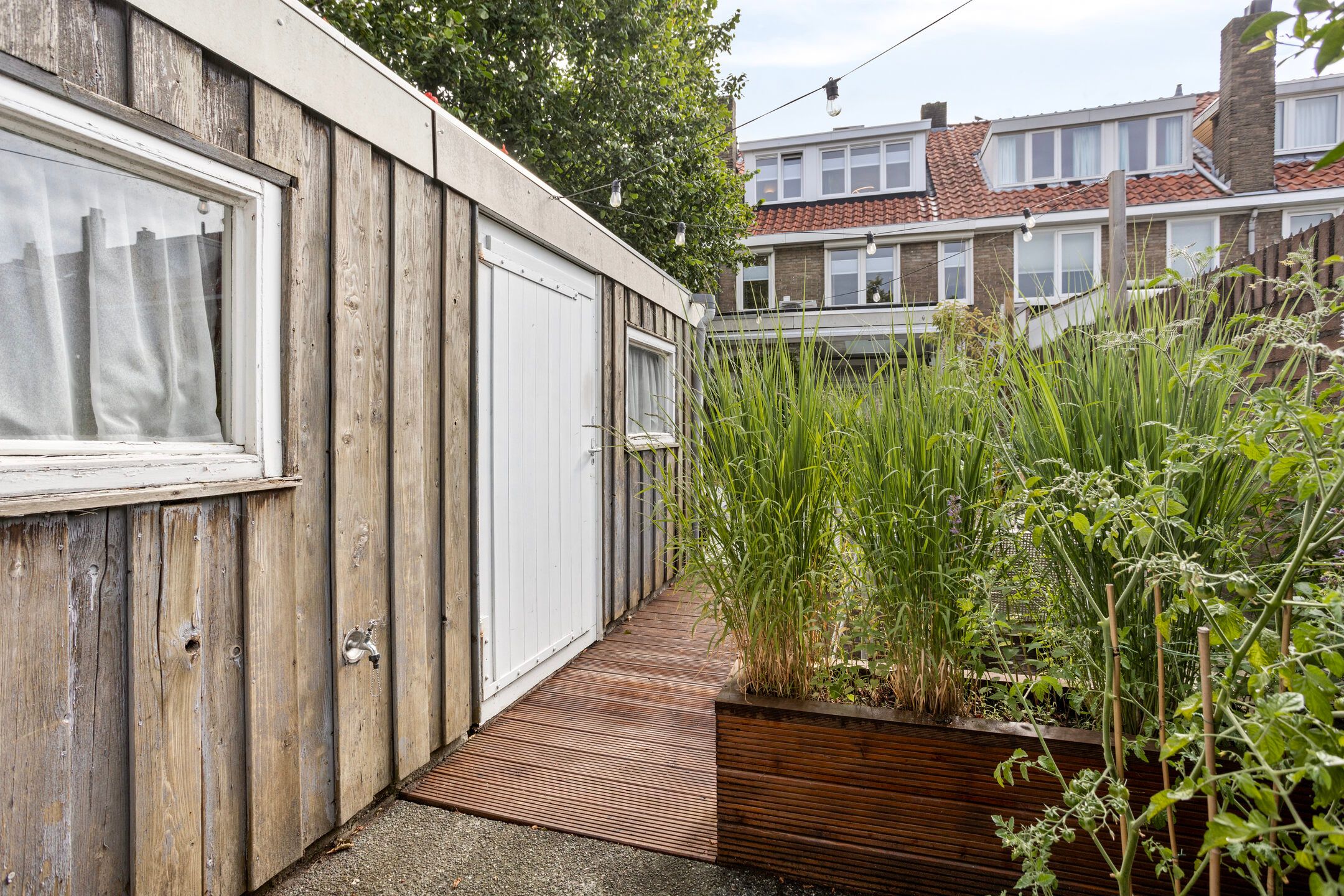 Charming renovated terraced home with sunny garden and modern amenities — 30