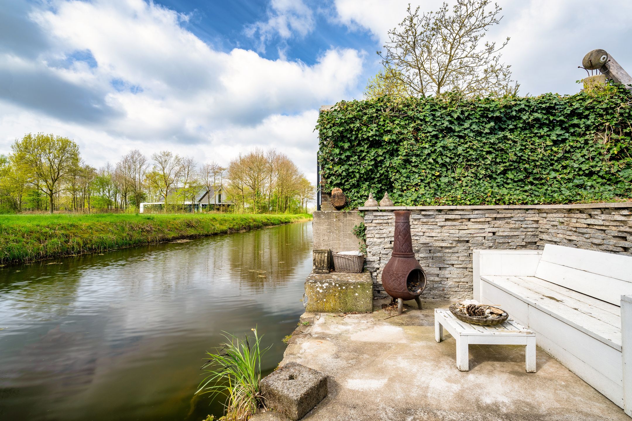 Architectural Waterfront Home with Glass Orangerie in Engelen — 42