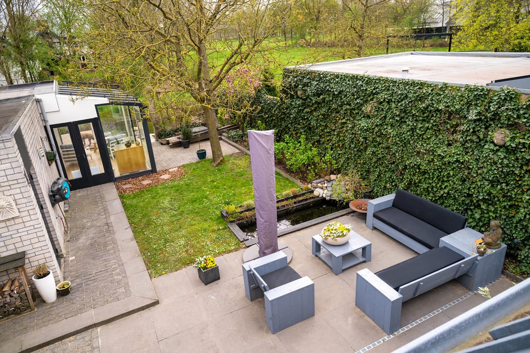 Architectural Waterfront Home with Glass Orangerie in Engelen — 52