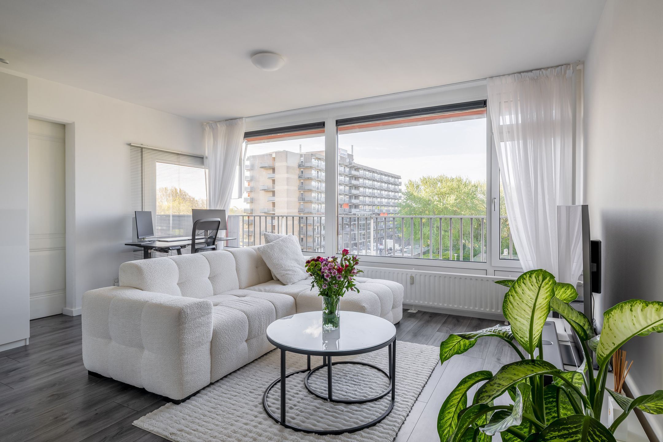 Move-in ready starter apartment with sunny south-facing balcony and private storage — 12