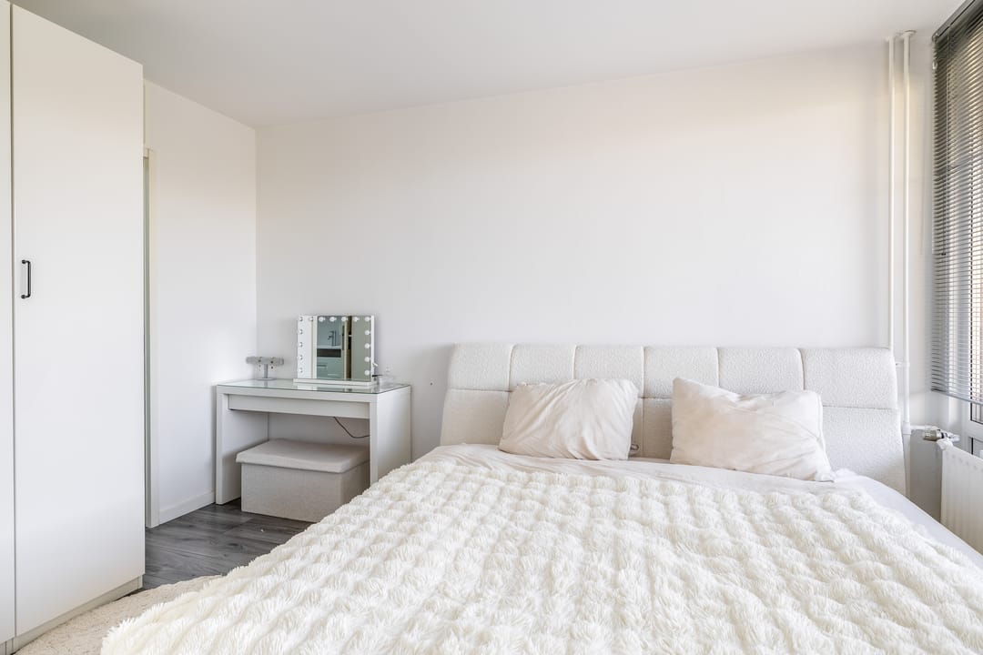 Move-in ready starter apartment with sunny south-facing balcony and private storage — 26