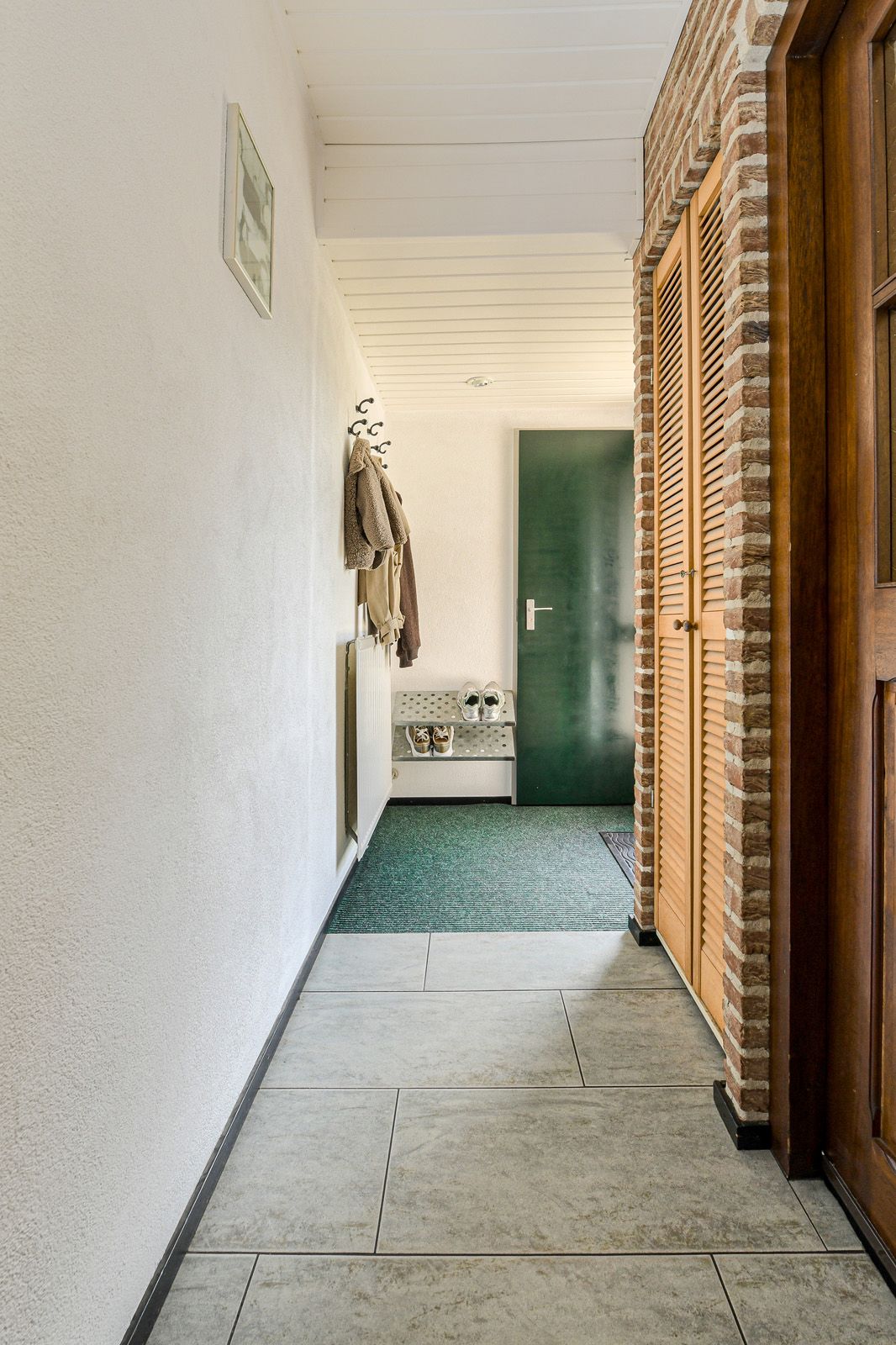 Extended terraced house with carport in Schildersbuurt — 17