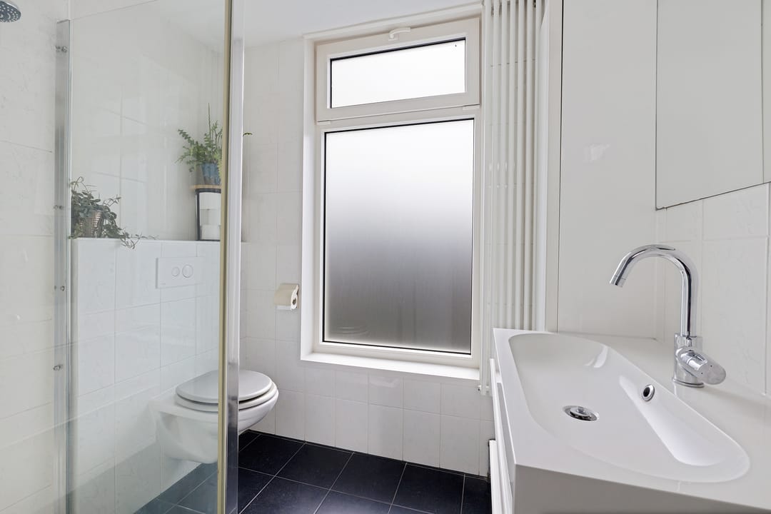 Foto 31 van Woudstraat 24