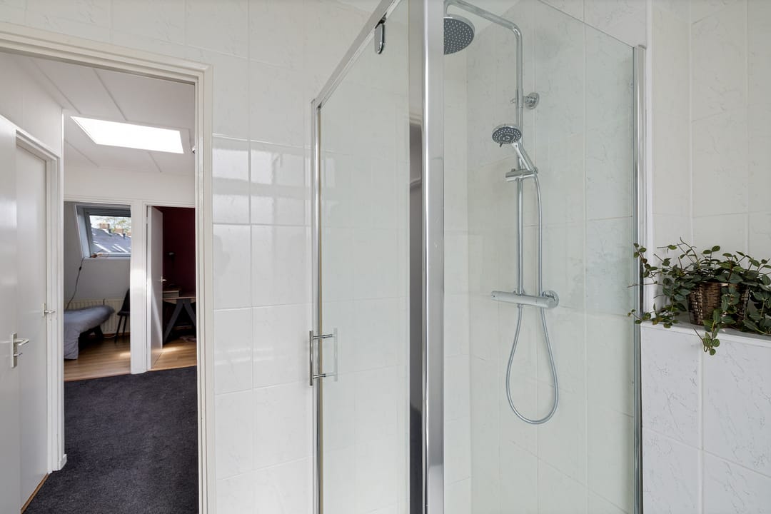 Foto 32 van Woudstraat 24