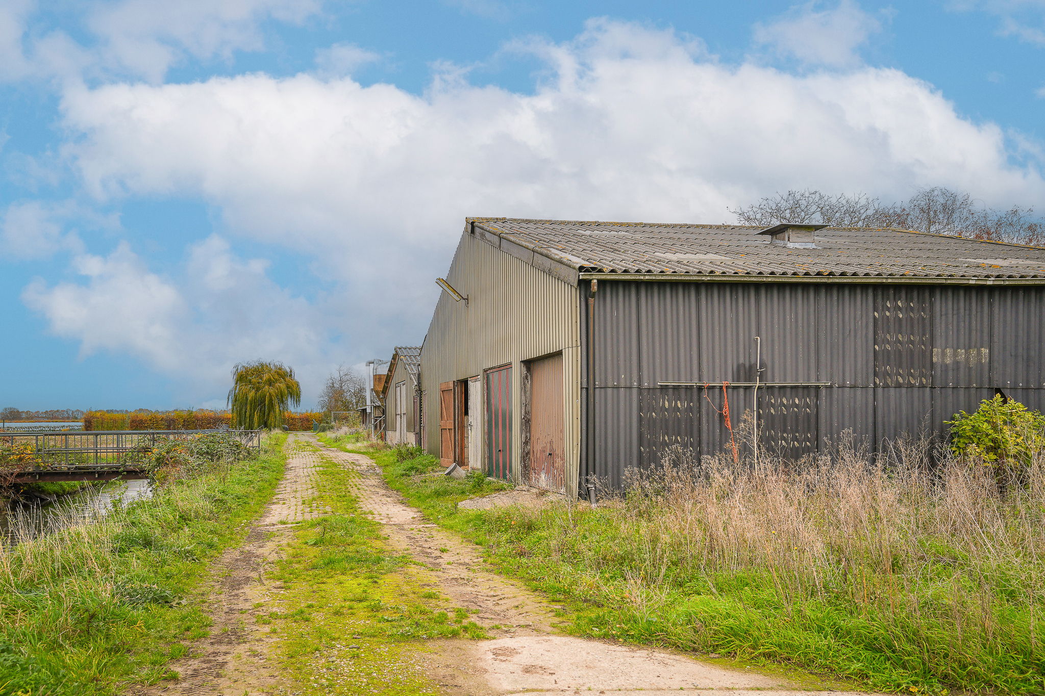 Detached farmhouse with spacious grounds and development potential in the Betuwe — 33